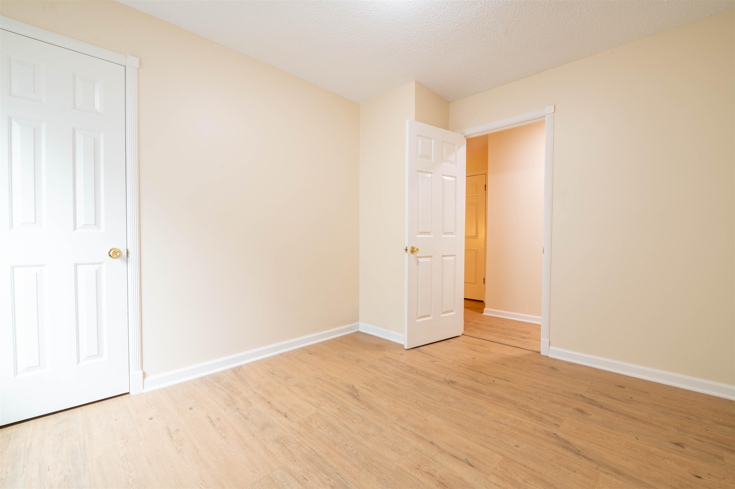 1642 Brierbrook Road Germantown, TN 38138 - Photo 30 of 37 Unfurnished bedroom featuring light wood-style flooring and baseboards