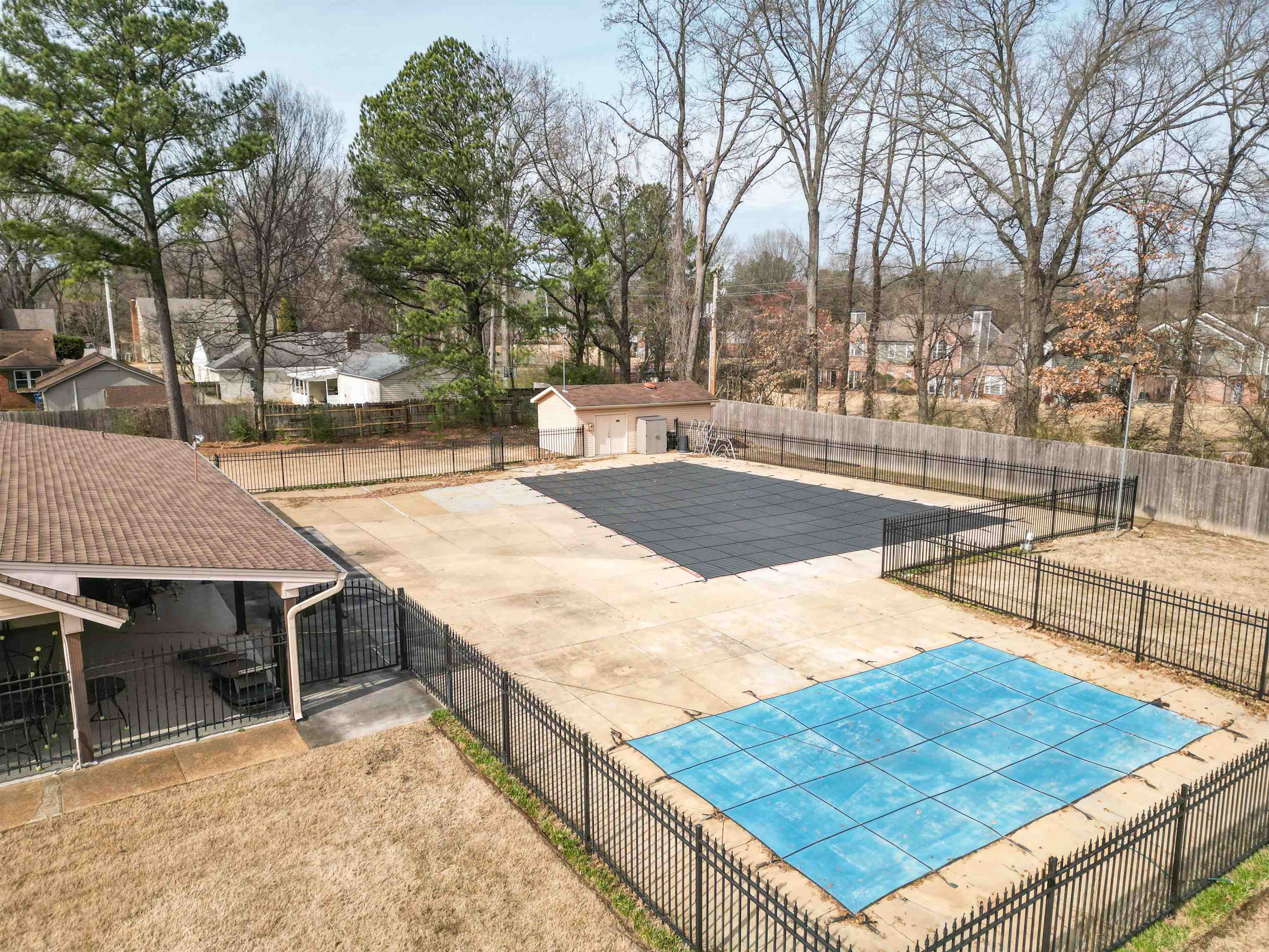 1642 Brierbrook Road Germantown, TN 38138 - Photo 35 of 37 View of pool with a patio and a storage unit