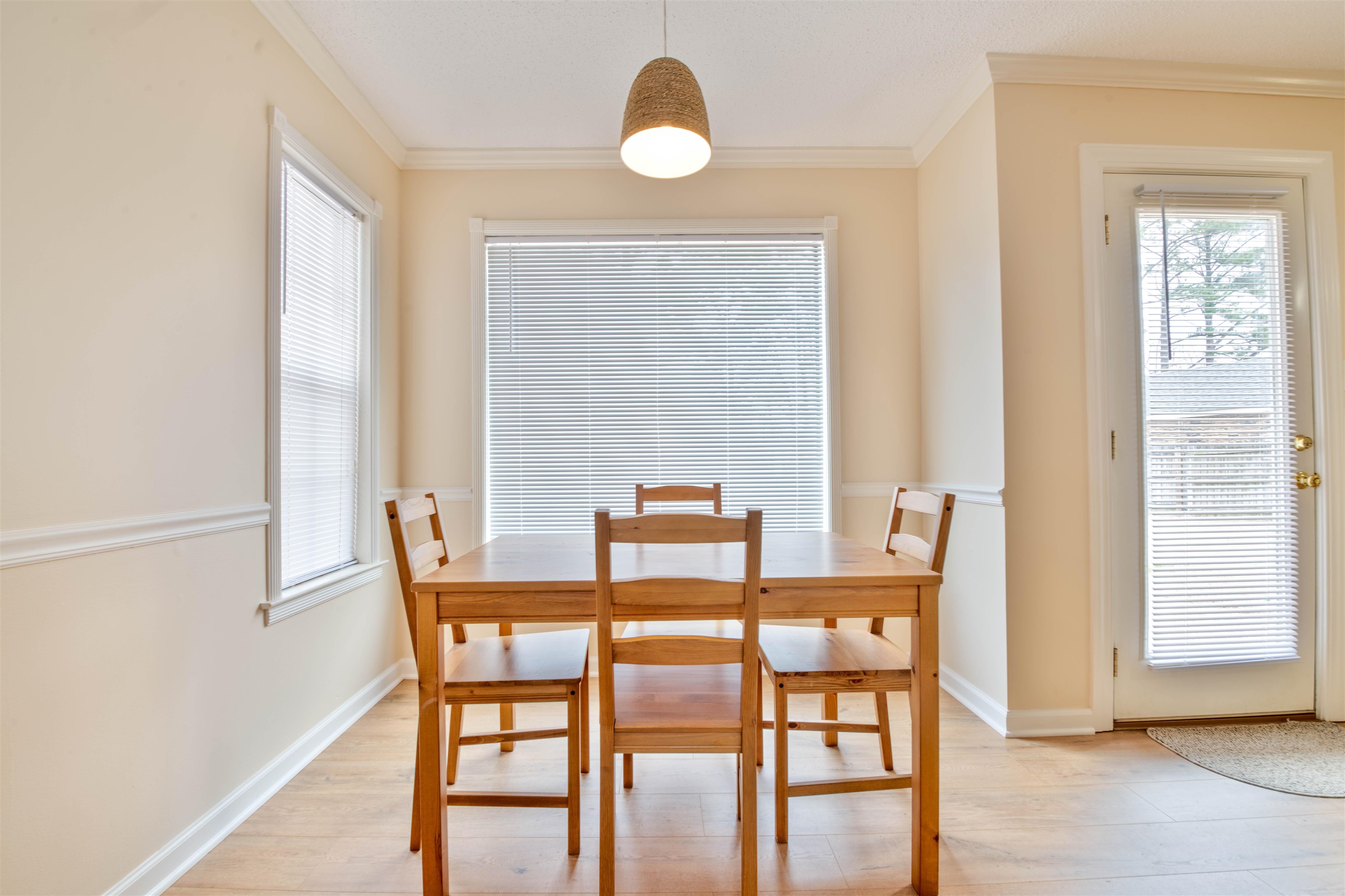 1642 Brierbrook Road Germantown, TN 38138 - Photo 7 of 37 Dining room featuring light wood-type flooring and crown molding