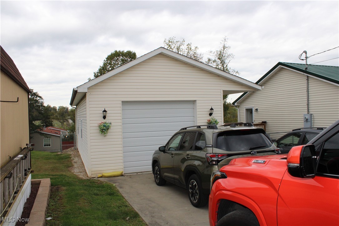 56 3rd Street Rayland, OH 43943 - Photo 7 of 46 Garage with concrete driveway