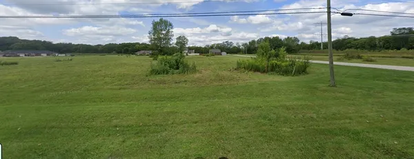 a view of a city from a yard