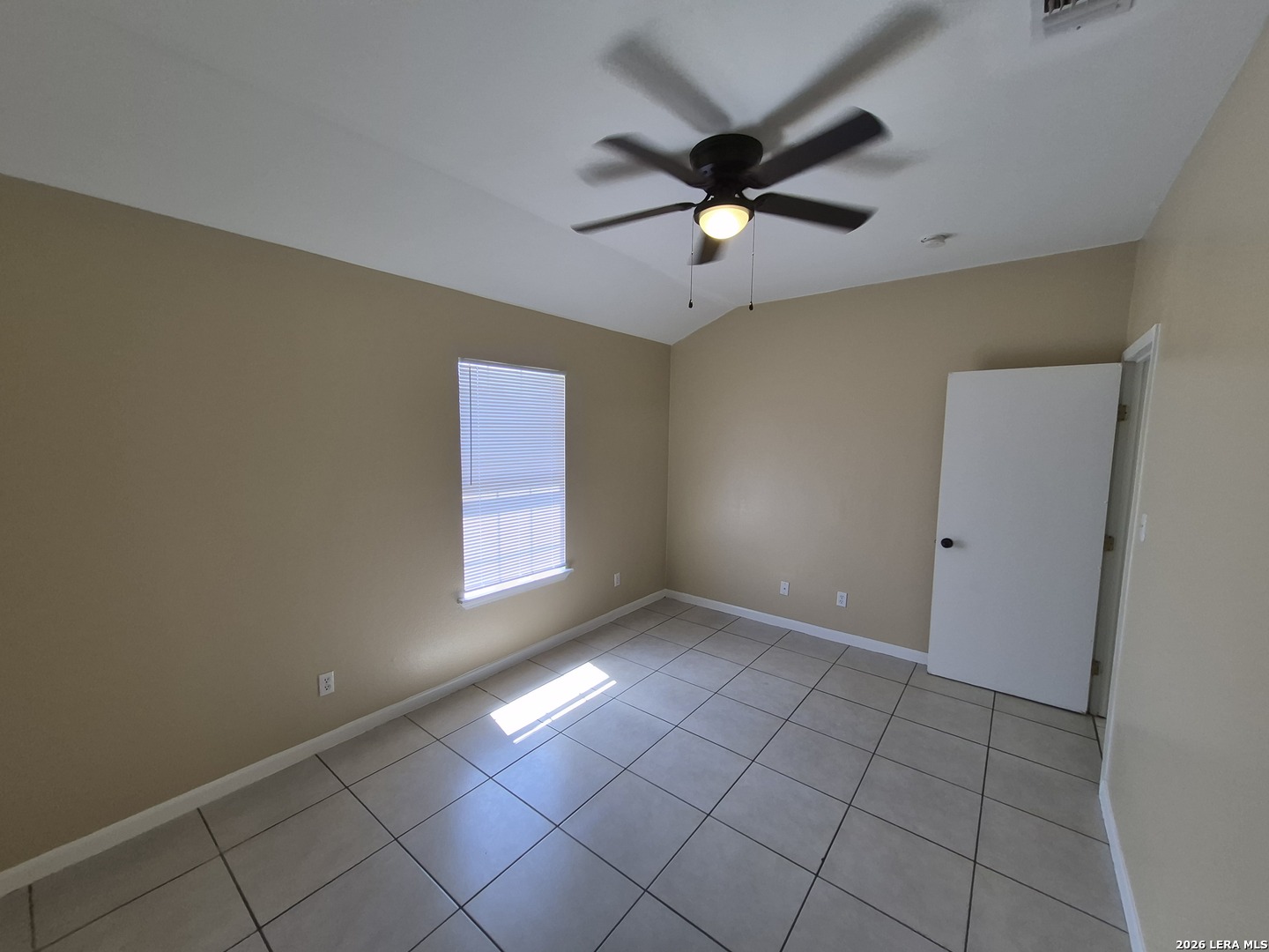 1016 Blanco Road, Unit 104 San Antonio, TX 78212 - Photo 15 of 23 a view of an empty room with a window