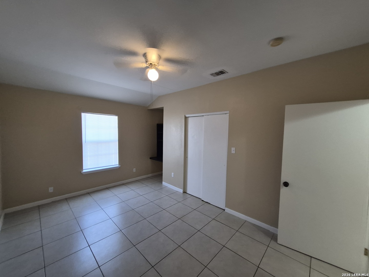 1016 Blanco Road, Unit 104 San Antonio, TX 78212 - Photo 19 of 23 a view of an empty room with a window
