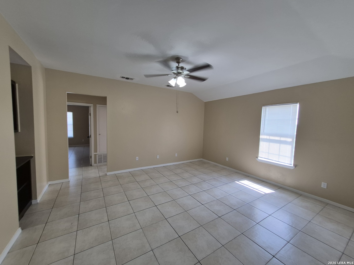 1016 Blanco Road, Unit 104 San Antonio, TX 78212 - Photo 2 of 23 a view of an empty room with a window