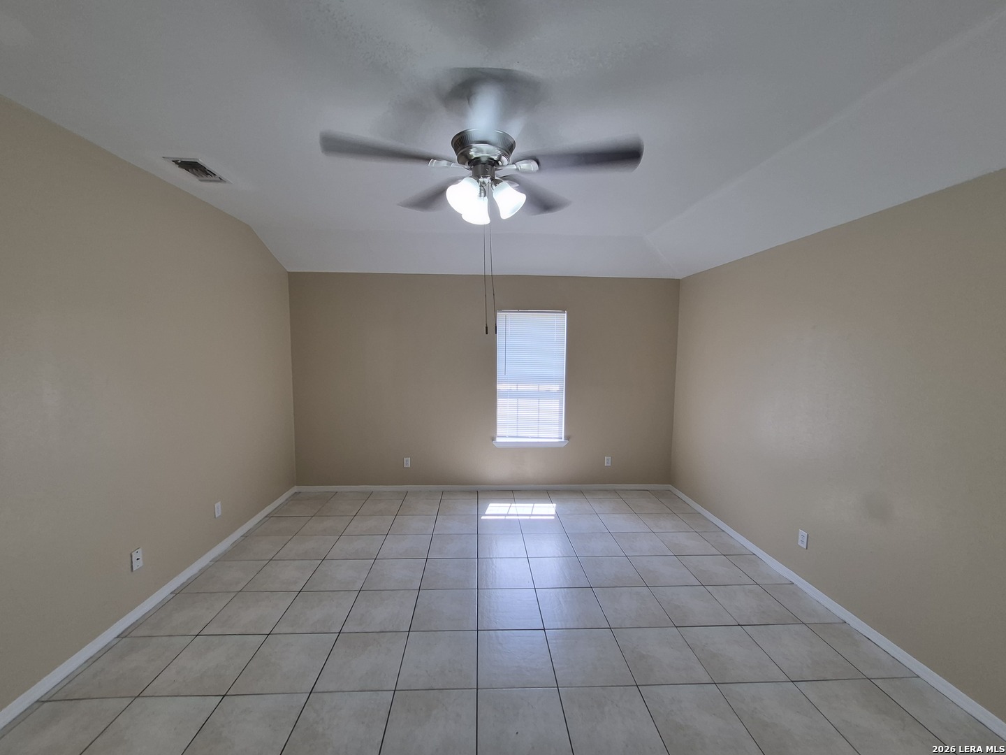 1016 Blanco Road, Unit 104 San Antonio, TX 78212 - Photo 4 of 23 a view of an empty room with a window