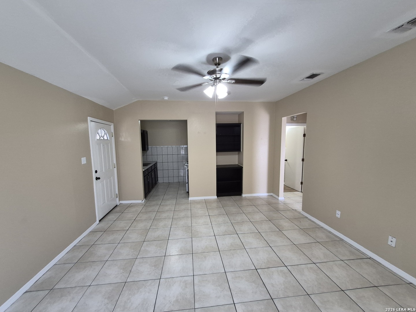 1016 Blanco Road, Unit 104 San Antonio, TX 78212 - Photo 5 of 23 a view of an empty room with a window