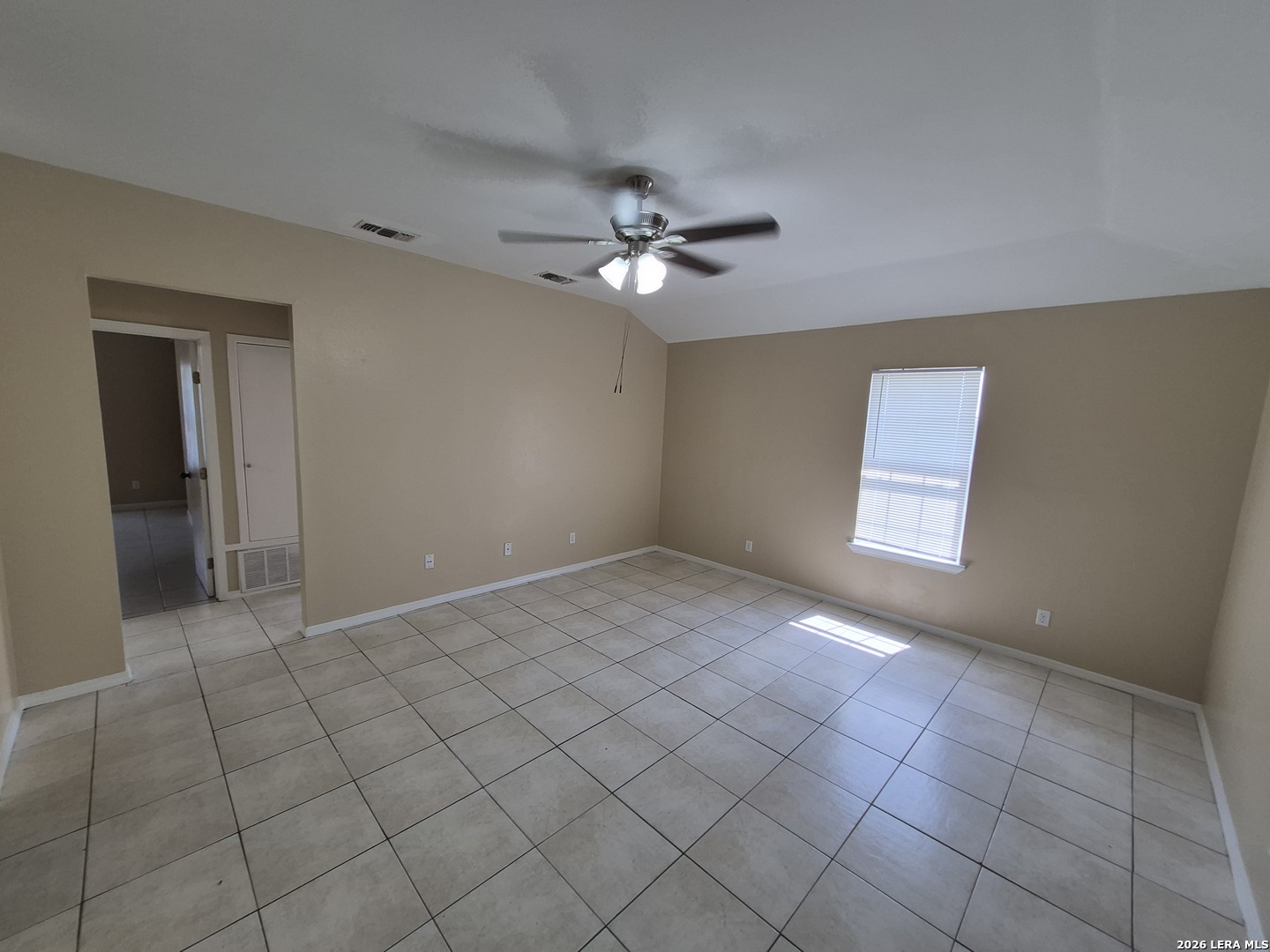 1016 Blanco Road, Unit 104 San Antonio, TX 78212 - Photo 7 of 23 a view of an empty room and chandelier fan