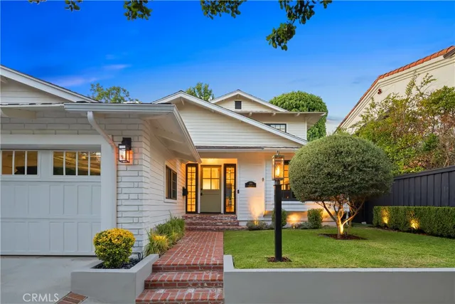 a view of a living room and dining room