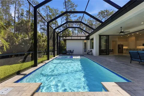 a view of an chairs and table in the balcony