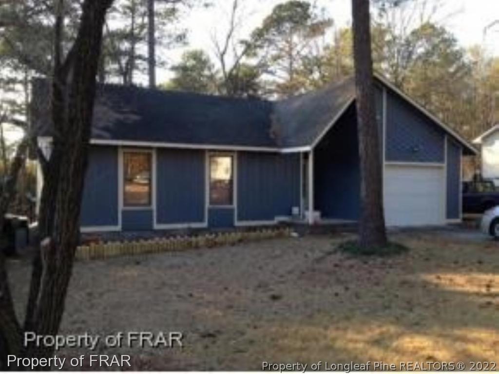 1766 Rim Road Fayetteville, NC 28314 - Photo 1 of 30 a view of a house with a yard