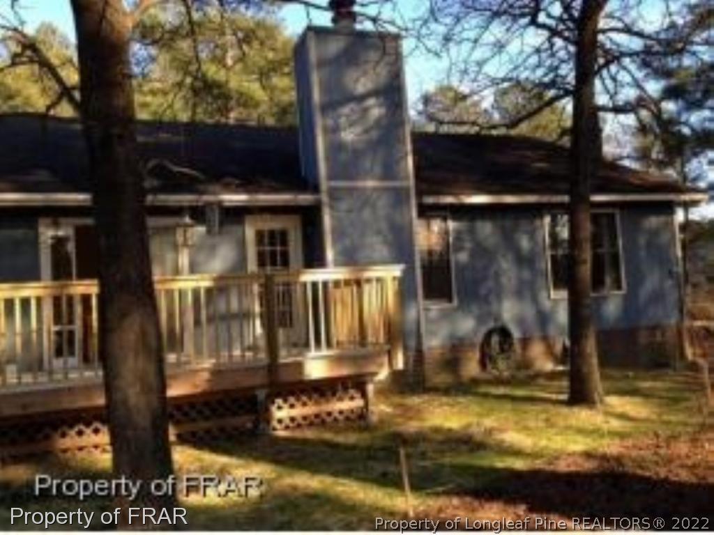 1766 Rim Road Fayetteville, NC 28314 - Photo 27 of 30 front view of house with a yard
