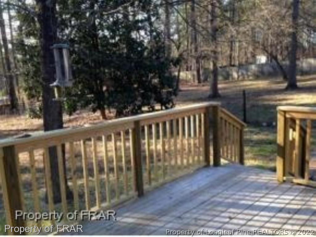 1766 Rim Road Fayetteville, NC 28314 - Photo 30 of 30 a view of a balcony with a tree