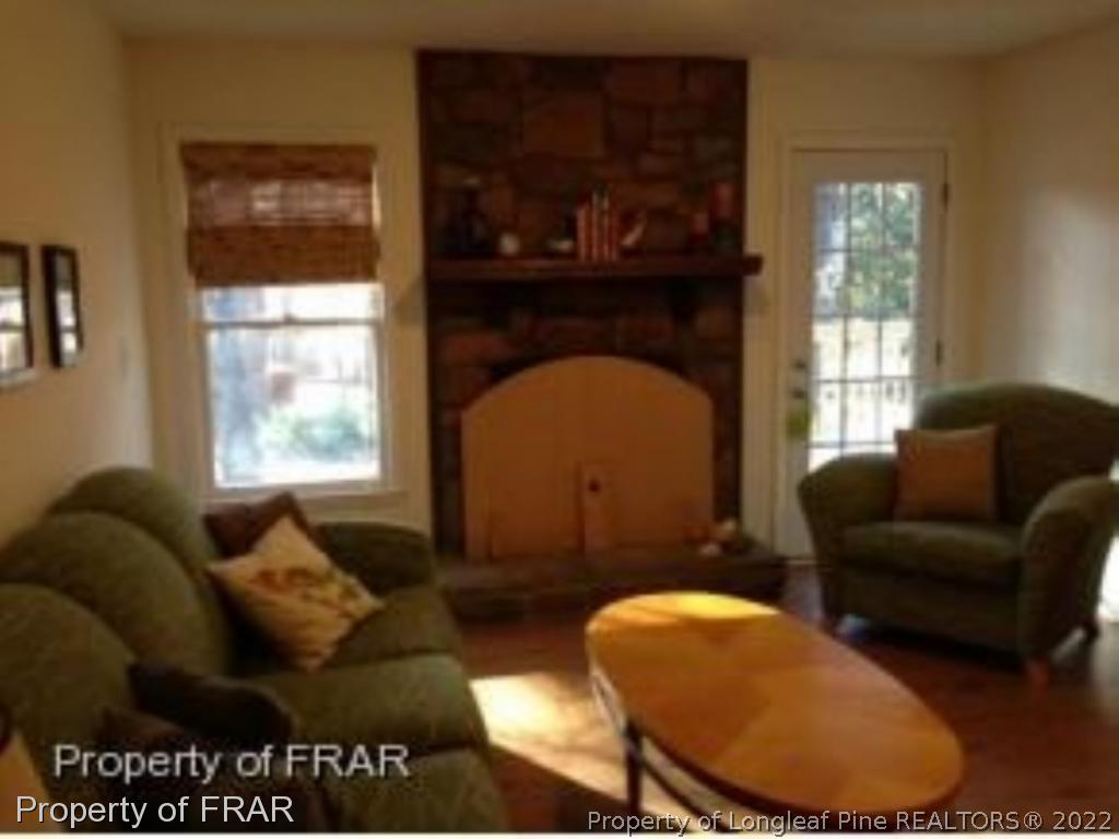 1766 Rim Road Fayetteville, NC 28314 - Photo 6 of 30 a living room with furniture and a window