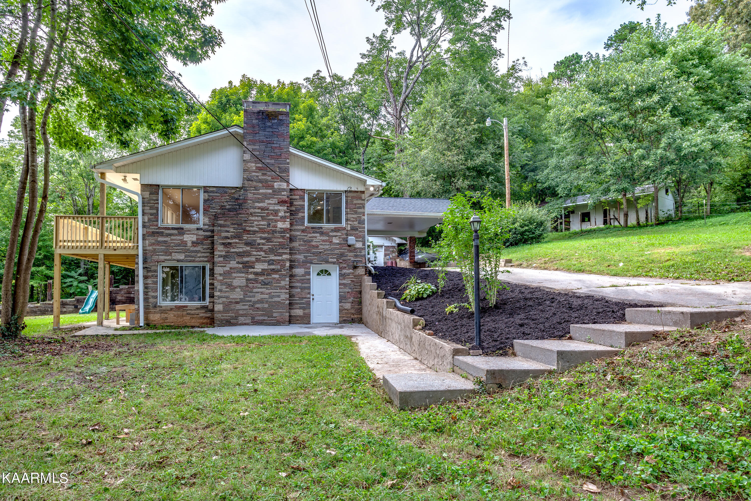 8024 Collier Road Powell, TN 37849 - Photo 23 of 25 8024 Collier Rd - Side