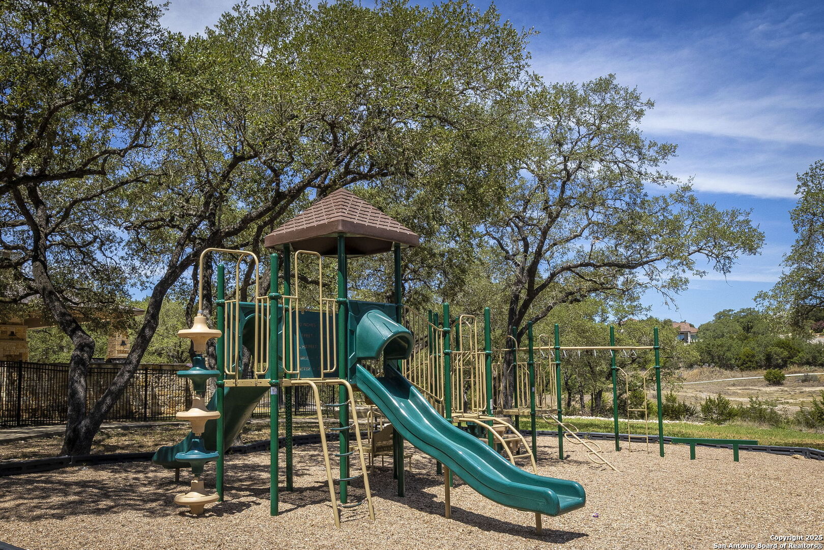 5860 Verden Ridge New Braunfels, TX 78132 - Photo 17 of 18 a view of a park with iron fence
