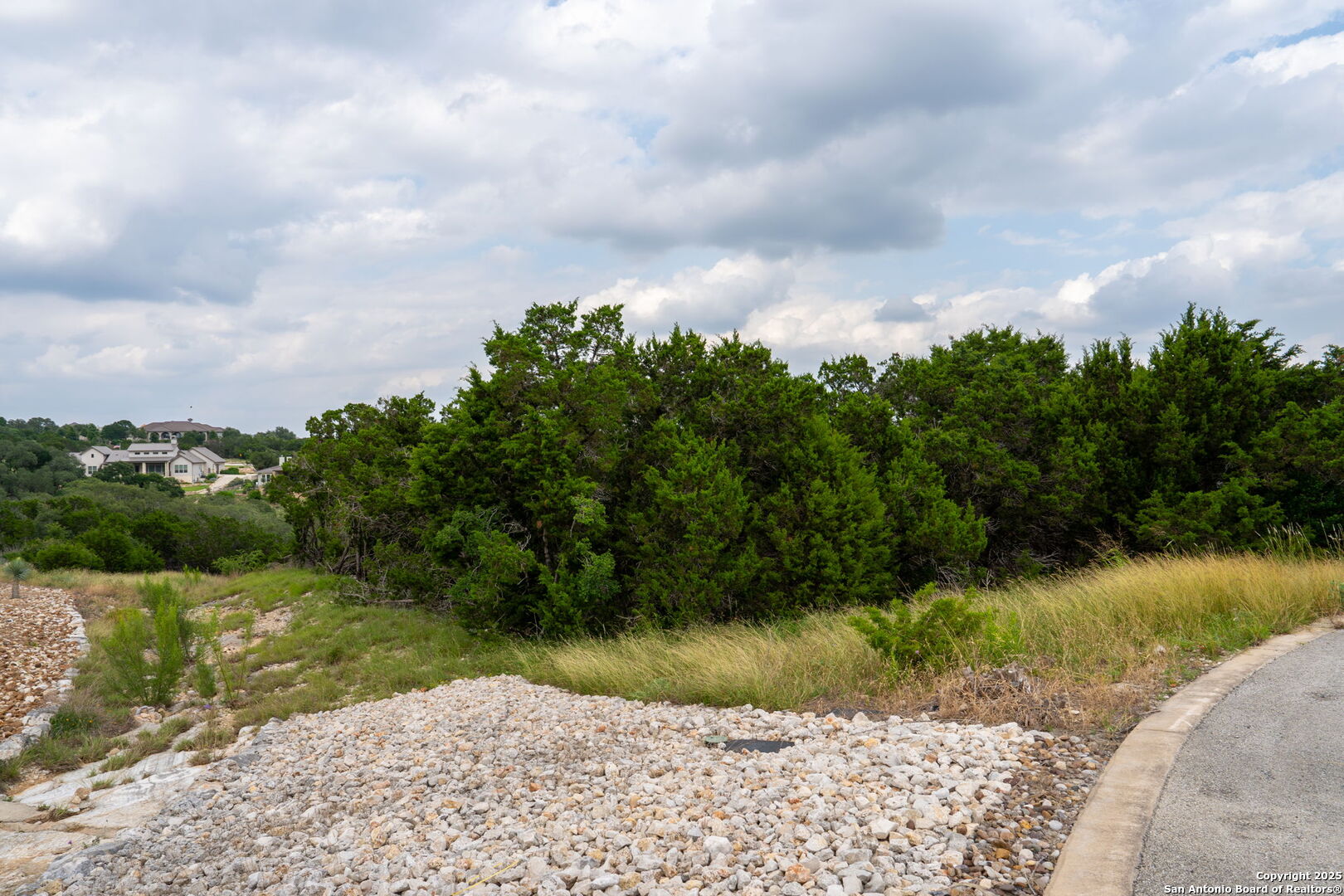 5860 Verden Ridge New Braunfels, TX 78132 - Photo 7 of 18 a view of a lake with a yard