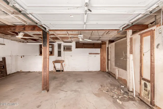 a view of a room with wooden walls