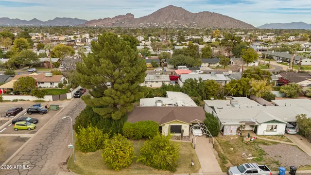 an aerial view of residential houses and outdoor space