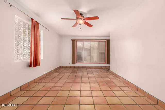 a view of an empty room and window