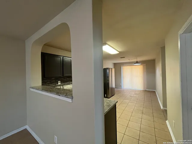 a view of hallway with mirror