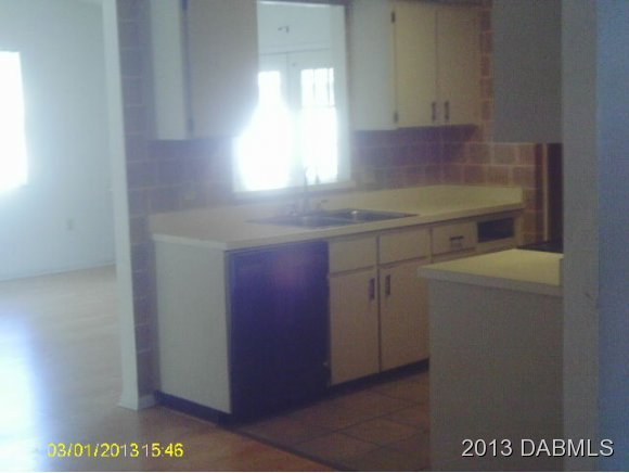134 Verona Road, Unit 2M DeBary, FL 32713 - Photo 4 of 8 a room with storage and utility