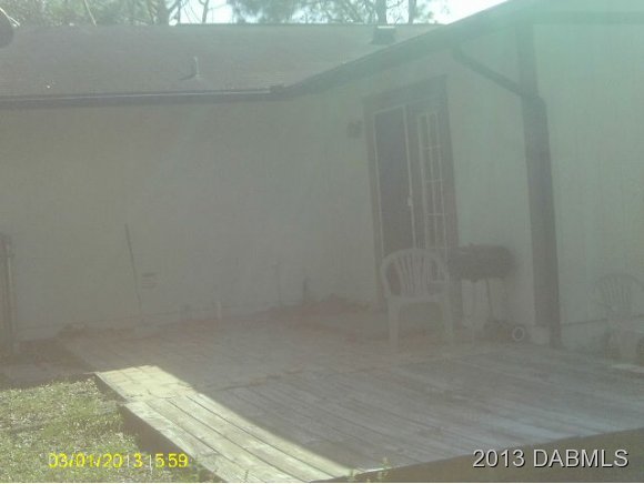 134 Verona Road, Unit 2M DeBary, FL 32713 - Photo 7 of 8 a bathroom with a shower