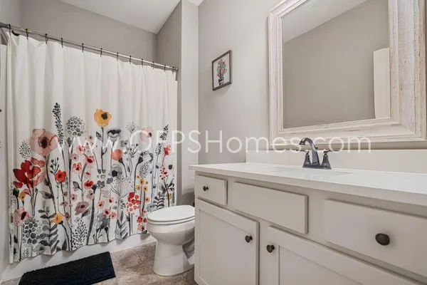 a bathroom with a sink and a toilet