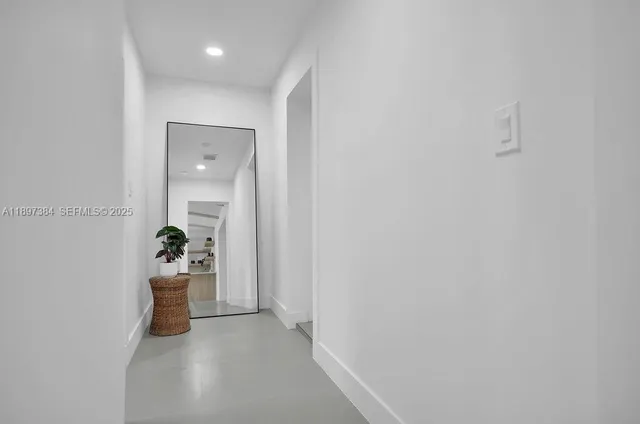a view of livingroom with washer and dryer