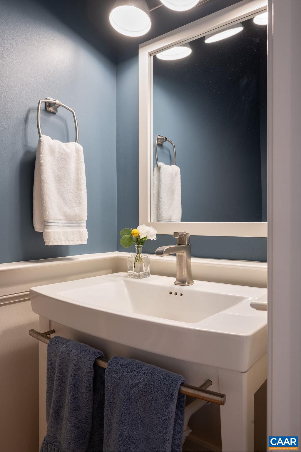 513 Half Mile Branch Road Crozet, VA 22932 - Photo 20 of 57 a bathroom with a sink and a mirror