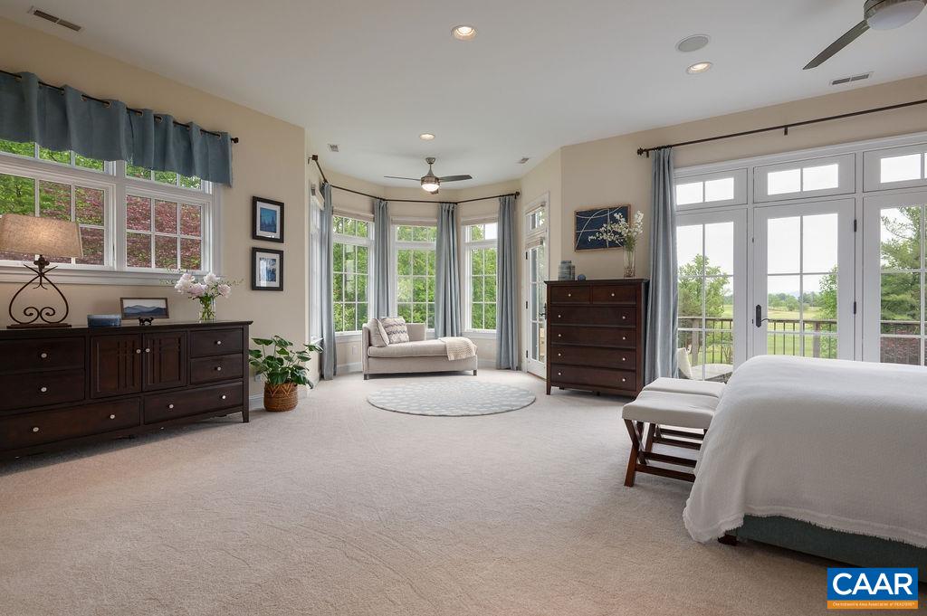 513 Half Mile Branch Road Crozet, VA 22932 - Photo 22 of 57 a living room with furniture and large windows