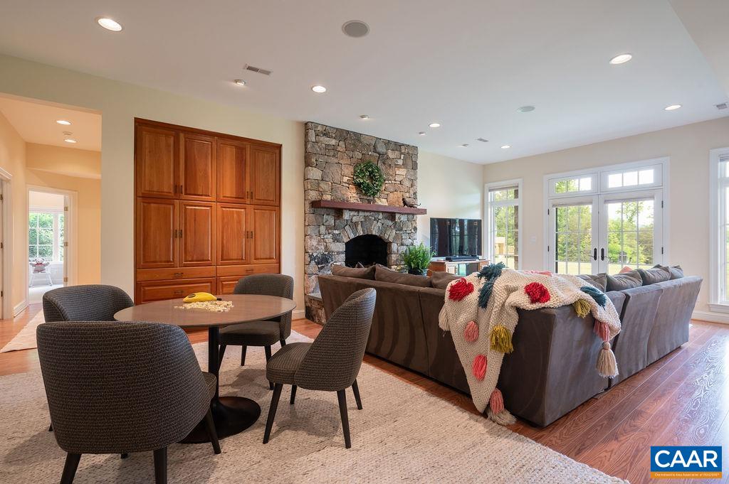 513 Half Mile Branch Road Crozet, VA 22932 - Photo 27 of 57 a living room with furniture and a large window