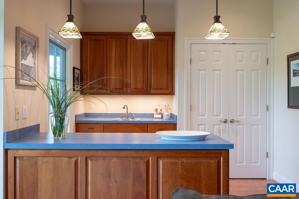 513 Half Mile Branch Road Crozet, VA 22932 - Photo 29 of 57 a bathroom with a sink and a mirror