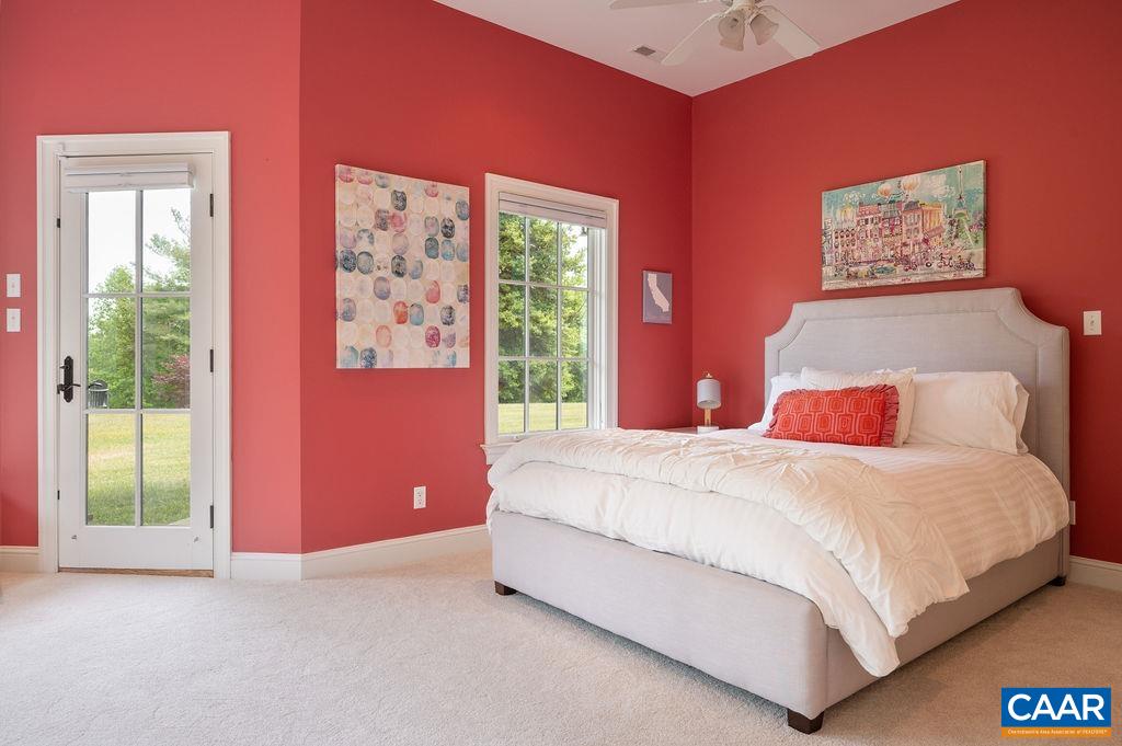 513 Half Mile Branch Road Crozet, VA 22932 - Photo 32 of 57 a bedroom with a bed and a window