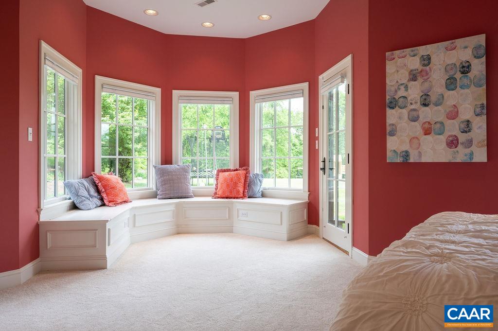 513 Half Mile Branch Road Crozet, VA 22932 - Photo 34 of 57 a living room with furniture and large windows