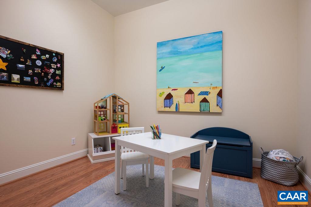 513 Half Mile Branch Road Crozet, VA 22932 - Photo 38 of 57 a workspace with furniture and wooden floor