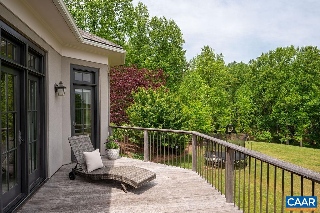 513 Half Mile Branch Road Crozet, VA 22932 - Photo 40 of 57 a view of a balcony with couch