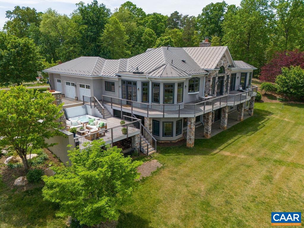 513 Half Mile Branch Road Crozet, VA 22932 - Photo 42 of 57 a aerial view of a house with swimming pool next to a yard