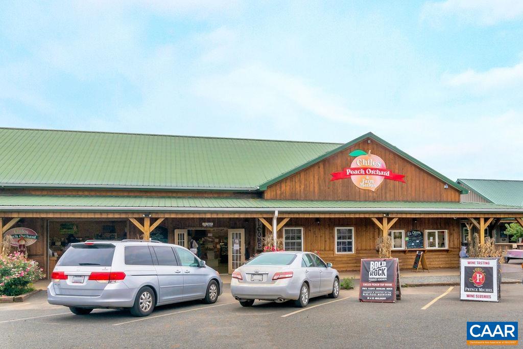 513 Half Mile Branch Road Crozet, VA 22932 - Photo 52 of 57 a car parked in front of a building