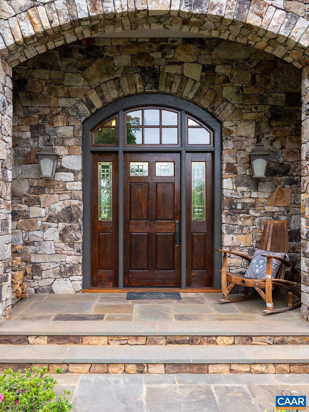 513 Half Mile Branch Road Crozet, VA 22932 - Photo 6 of 57 a front view of a house with a garden