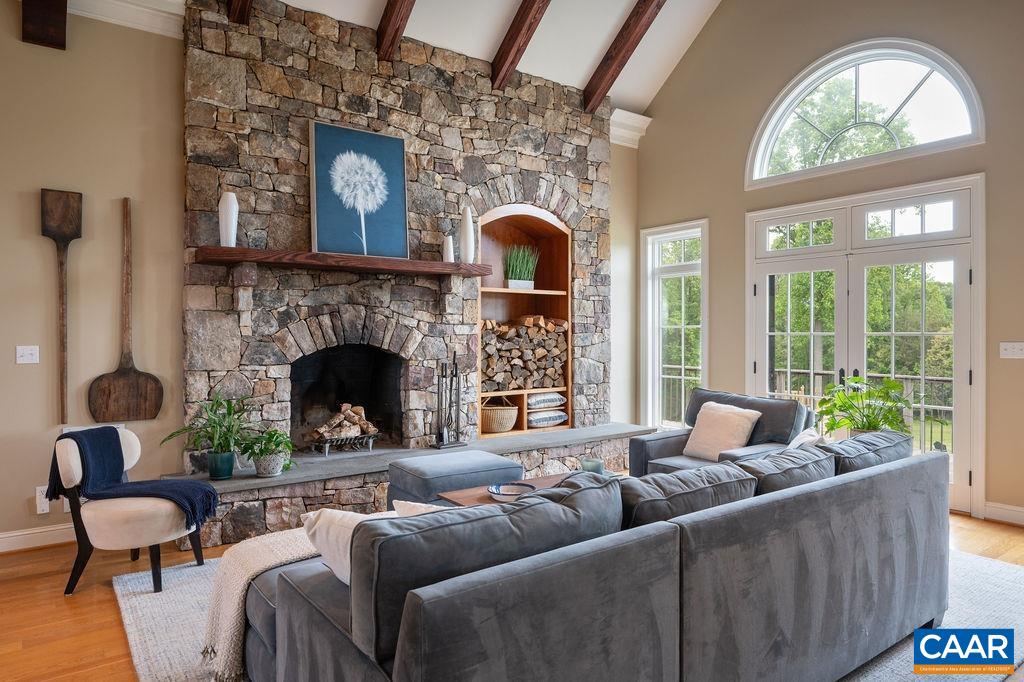 513 Half Mile Branch Road Crozet, VA 22932 - Photo 10 of 57 a living room with furniture and a fireplace