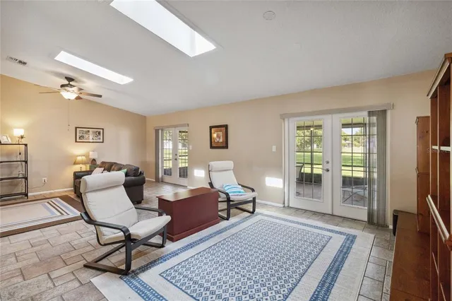 a bathroom with a sink a toilet a shower and a mirror