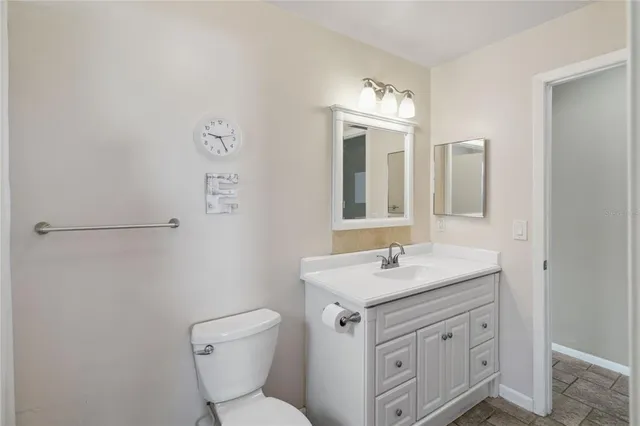 a view of a backyard with small cabin