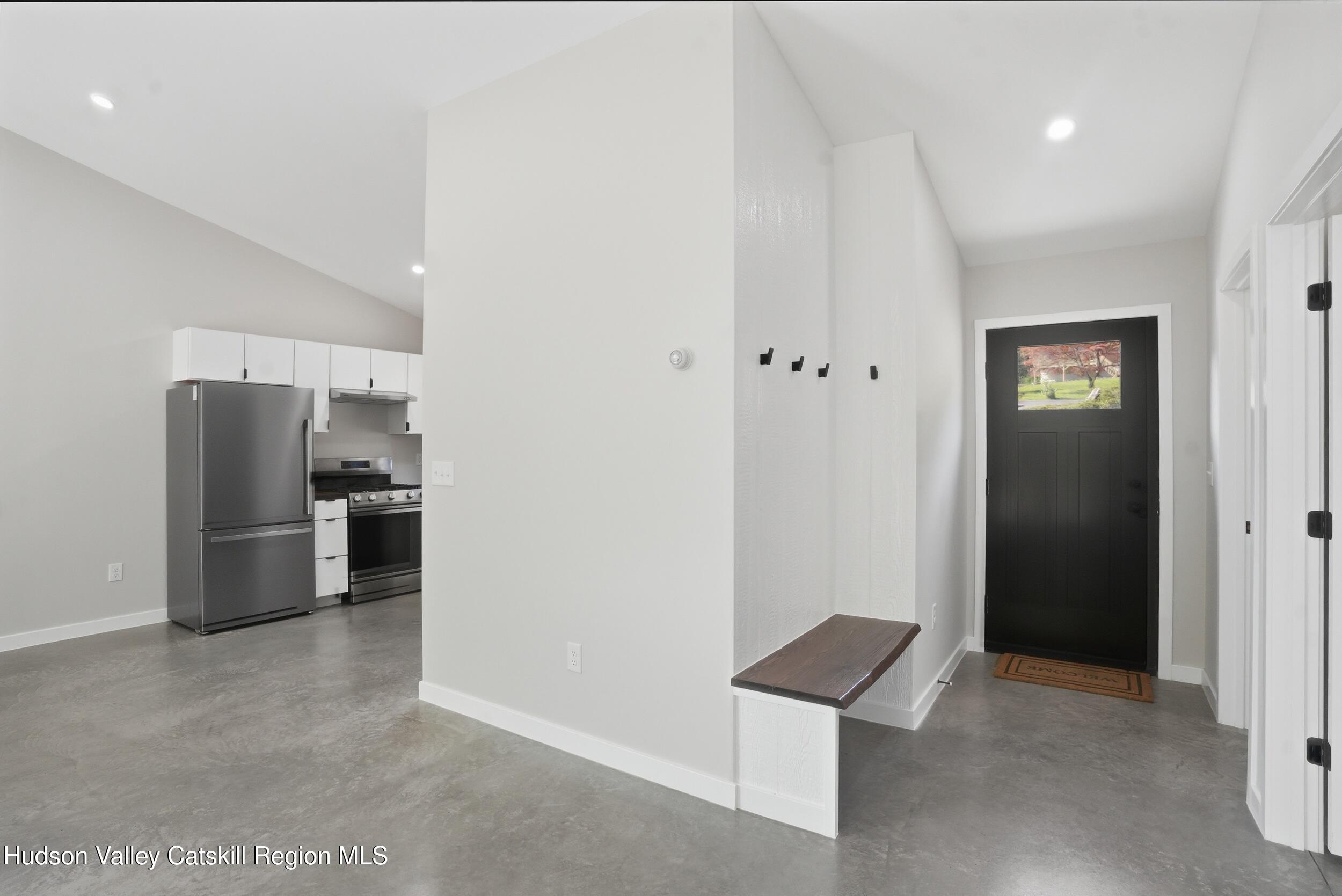 349 High Point Mountain Road West Shokan, NY 12494 - Photo 6 of 25 a view of a kitchen with refrigerator and a stove