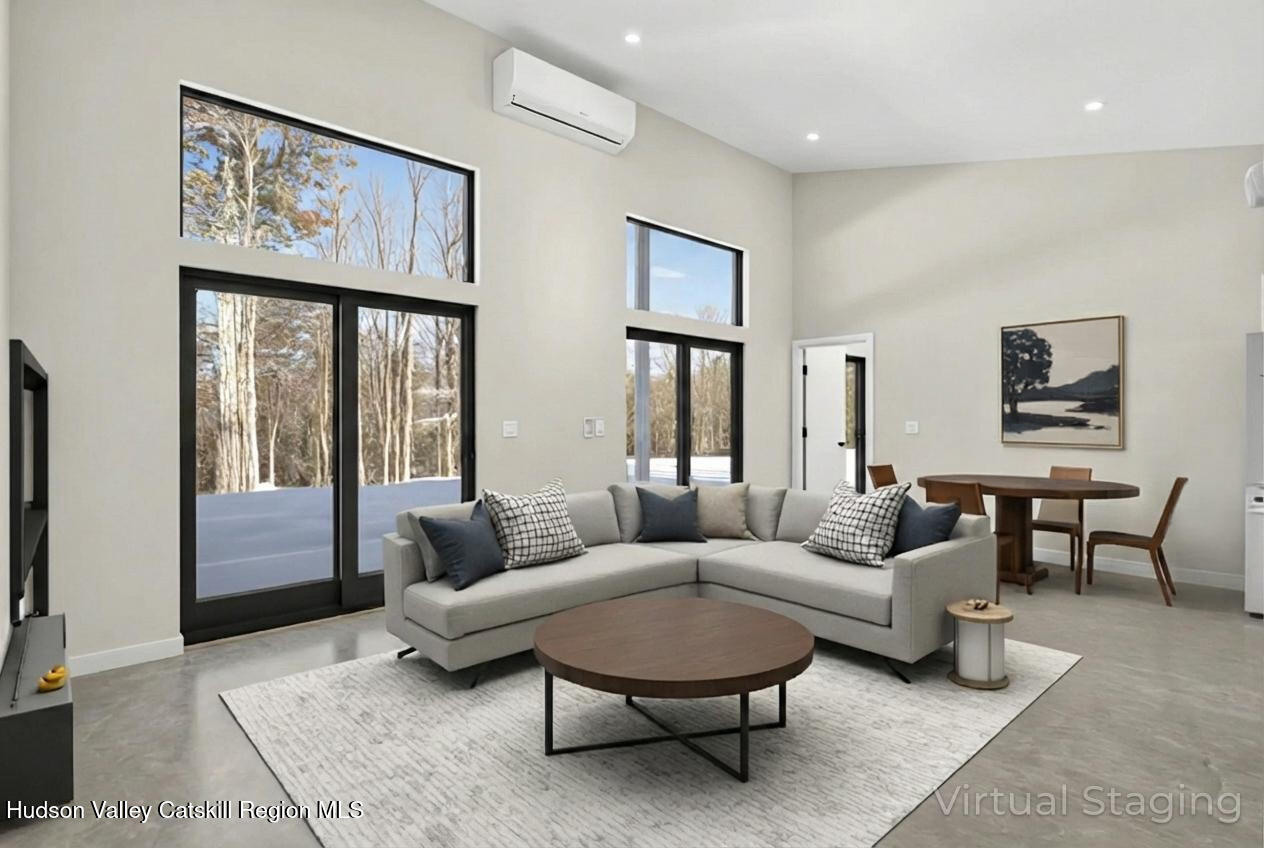 349 High Point Mountain Road West Shokan, NY 12494 - Photo 8 of 25 a living room with furniture or couch and a potted plant