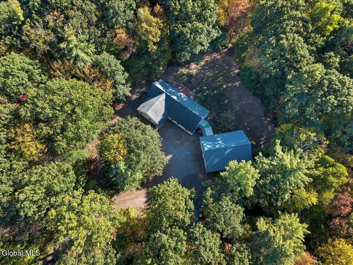 815 Co Rte 25 Corinth, NY 12822 - Photo 2 of 52 30-DJI_20250919163314_0167_D