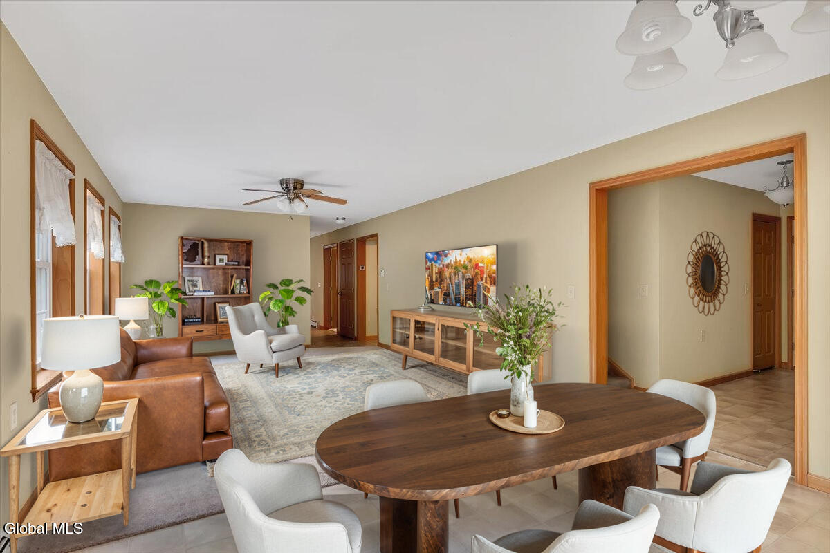 815 Co Rte 25 Corinth, NY 12822 - Photo 3 of 52 815 Co Rt 25 LR DR virtually staged