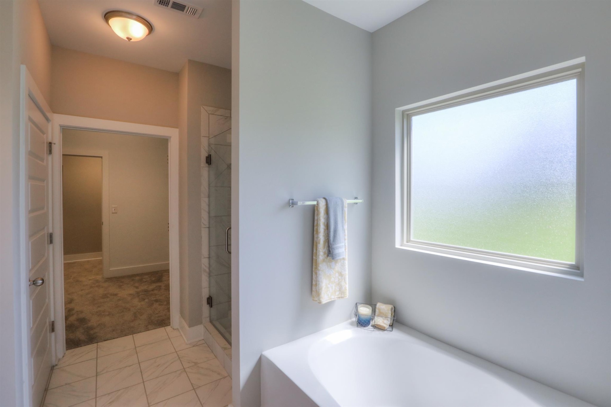 376 Cloverbrook Way Gallatin, TN 37066 - Photo 13 of 24 a bathroom with a sink a mirror and a shower