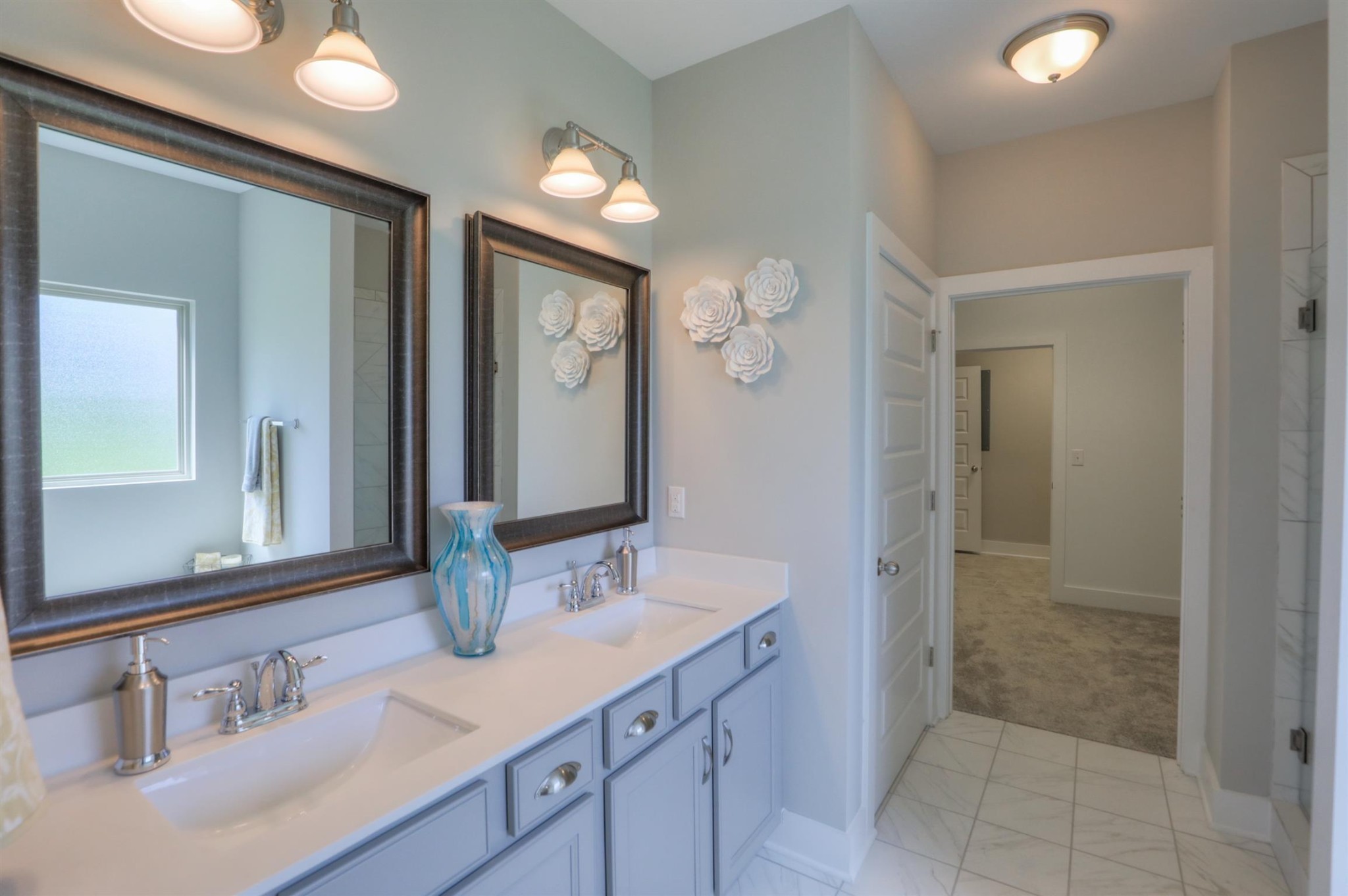 376 Cloverbrook Way Gallatin, TN 37066 - Photo 14 of 24 a bathroom with a sink and a mirror
