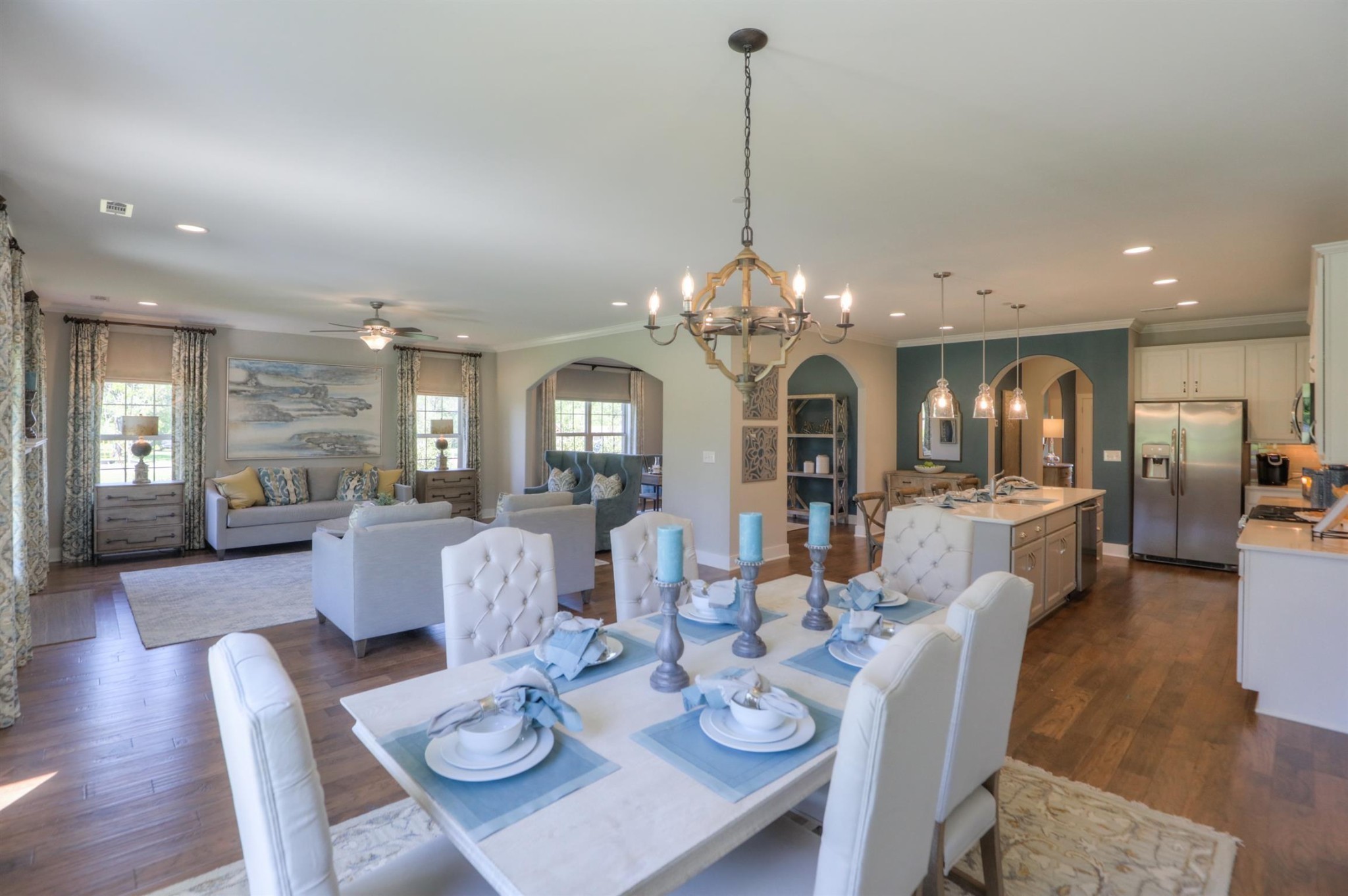 376 Cloverbrook Way Gallatin, TN 37066 - Photo 10 of 24 a view of a dining room and livingroom with furniture wooden floor a chandelier