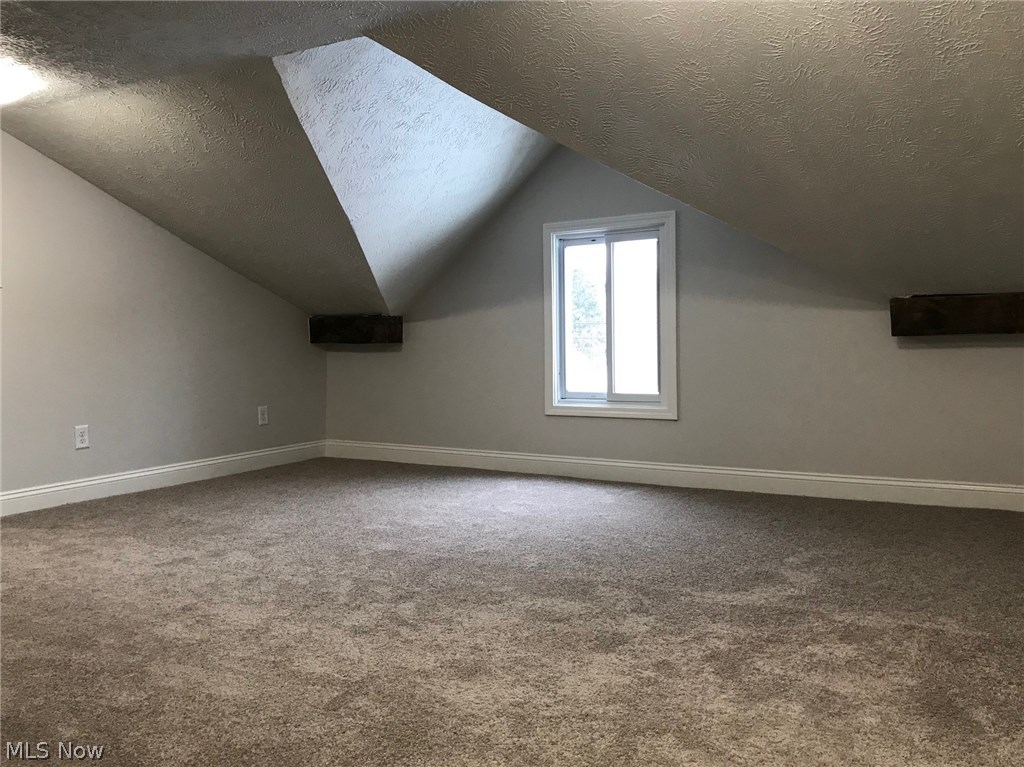 6510 North Ridge Road West Ashtabula, OH 44004 - Photo 18 of 20 Rec/play room situated upstairs between two bedrooms